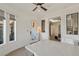 Bright home office features marble desk and view into bedroom at 1 Panorama Crest Ave, Las Vegas, NV 89135