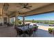 Covered patio with seating and pool view at 1 Panorama Crest Ave, Las Vegas, NV 89135