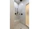 Elegant shower with marble walls and built-in seat at 1 Panorama Crest Ave, Las Vegas, NV 89135