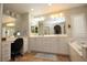 Elegant bathroom with double vanity, soaking tub, and shower at 10418 Prairie Mountain Ave, Las Vegas, NV 89166