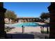 Inviting community pool with lounge chairs and a spa at 10418 Prairie Mountain Ave, Las Vegas, NV 89166