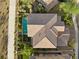 House with tile roof and pool, seen from above at 11952 Girasole Ave, Las Vegas, NV 89138