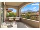 Relaxing balcony with outdoor seating and mountain views at 11952 Girasole Ave, Las Vegas, NV 89138