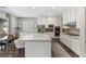 Spacious kitchen with white cabinets, granite countertops, and stainless steel appliances at 11952 Girasole Ave, Las Vegas, NV 89138