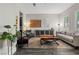 Elegant living room with a large sofa and statement coffee table at 11952 Girasole Ave, Las Vegas, NV 89138