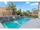 Relax and enjoy this large, inviting pool with waterfall feature at 11952 Girasole Ave, Las Vegas, NV 89138