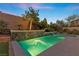 Enjoy this beautiful backyard pool with a cascading waterfall feature at 11952 Girasole Ave, Las Vegas, NV 89138