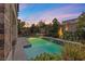 Relaxing pool and spa area with stunning sunset views at 11952 Girasole Ave, Las Vegas, NV 89138