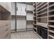 Large walk-in closet with ample shelving and drawers at 11952 Girasole Ave, Las Vegas, NV 89138