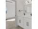 Modern bathroom featuring double sinks with stylish black hardware and great lighting at 1308 E Nelson Ave, North Las Vegas, NV 89030