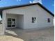 Rear view of a single-story home featuring a covered patio at 1308 E Nelson Ave, North Las Vegas, NV 89030