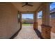 Covered patio with brick pavers and a view of the backyard at 131 Mosso Niente Pl, Henderson, NV 89011