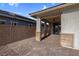 Covered patio with brick pavers and ceiling fan at 131 Mosso Niente Pl, Henderson, NV 89011