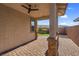 Covered patio with brick pavers and a view of the backyard at 131 Mosso Niente Pl, Henderson, NV 89011