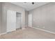 Bedroom with ceiling fan, neutral walls, and a closet at 131 Mosso Niente Pl, Henderson, NV 89011