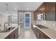 Spacious kitchen with stainless steel appliances and granite countertops at 131 Mosso Niente Pl, Henderson, NV 89011