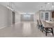 Bright and airy living room with tile floors and neutral walls at 131 Mosso Niente Pl, Henderson, NV 89011