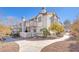 Spanish style condo with walkway and landscaping at 1690 Normandy Way # 824, Henderson, NV 89014