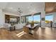 Open dining area with large windows and modern light fixture at 2548 Faiss Dr, Las Vegas, NV 89134