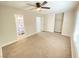 Spacious bedroom with neutral carpeting and an ensuite bathroom at 2604 Yardley St, Las Vegas, NV 89102