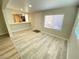 Bright dining area with wood-look floors and kitchen access at 2604 Yardley St, Las Vegas, NV 89102