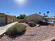 Landscaped yard with gravel and drought-tolerant plants at 2604 Yardley St, Las Vegas, NV 89102