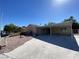 Single-story house with carport and desert landscaping at 2604 Yardley St, Las Vegas, NV 89102