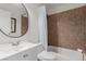 Bathroom with tub, white vanity, and large mirror at 2828 Richfield Blvd, Las Vegas, NV 89102