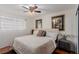 Spacious bedroom with king-size bed and ceiling fan at 2828 Richfield Blvd, Las Vegas, NV 89102