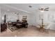 Open concept dining area with glass table and chairs at 2828 Richfield Blvd, Las Vegas, NV 89102