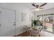 Bright dining area with glass table and access to backyard at 2828 Richfield Blvd, Las Vegas, NV 89102