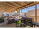 Covered patio with grill, seating area, and backyard views at 2828 Richfield Blvd, Las Vegas, NV 89102