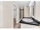 Modern bathroom with single vanity and walk-in shower at 3108 Emmons St, North Las Vegas, NV 89030