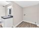 Bathroom featuring a modern vanity with countertop and sink, tiled floors, and ample natural light at 3108 Emmons St, North Las Vegas, NV 89030