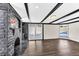 Living room with fireplace, built-in shelving, and pool access at 3108 Emmons St, North Las Vegas, NV 89030