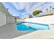 Refreshing kidney-shaped pool with patio at 3108 Emmons St, North Las Vegas, NV 89030