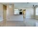 Open concept dining area with kitchen and breakfast bar at 3150 Soft Breezes Dr # 2030, Las Vegas, NV 89128