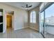 Dining area with patio access, ceiling fan, and tile floors at 3150 Soft Breezes Dr # 2030, Las Vegas, NV 89128