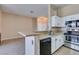 Updated kitchen with stainless steel appliances and a dishwasher at 3150 Soft Breezes Dr # 2030, Las Vegas, NV 89128