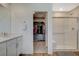 Bright bathroom with double vanity and walk-in closet at 3354 Via Strada St, Henderson, NV 89044