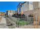 Fenced dog park with artificial turf at 3354 Via Strada St, Henderson, NV 89044