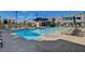 Community swimming pool with surrounding lounge chairs at 3354 Via Strada St, Henderson, NV 89044