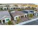 Aerial view of a house with solar panels and a brick driveway at 349 Agnew St, Las Vegas, NV 89138