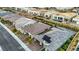 Aerial view of a house with solar panels and a brick driveway at 349 Agnew St, Las Vegas, NV 89138