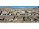 Aerial view of houses with solar panels and mountain views at 349 Agnew St, Las Vegas, NV 89138