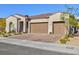 Single-story home with three-car garage and landscaped front yard at 349 Agnew St, Las Vegas, NV 89138