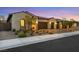 Stunning home exterior at dusk with three-car garage at 349 Agnew St, Las Vegas, NV 89138