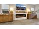 Modern electric fireplace with wood-look mantel and built-in shelving at 349 Agnew St, Las Vegas, NV 89138