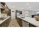 Open concept kitchen with island and stainless steel appliances at 349 Agnew St, Las Vegas, NV 89138