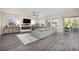 Spacious living room featuring a modern fireplace and large windows at 349 Agnew St, Las Vegas, NV 89138